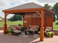 traditional wooden pavilion with privacy wall