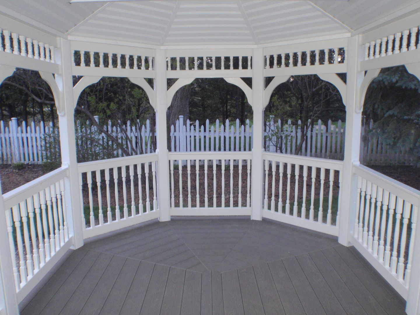 10 by 14 foot wooden oval gazebo with wooden flooring