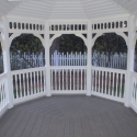 10 by 14 foot wooden oval gazebo with wooden flooring