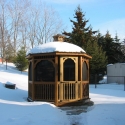 10 foot wooden octagon gazebo covered in snow