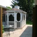 white vinyl 8 by 12 foot oval gazebo