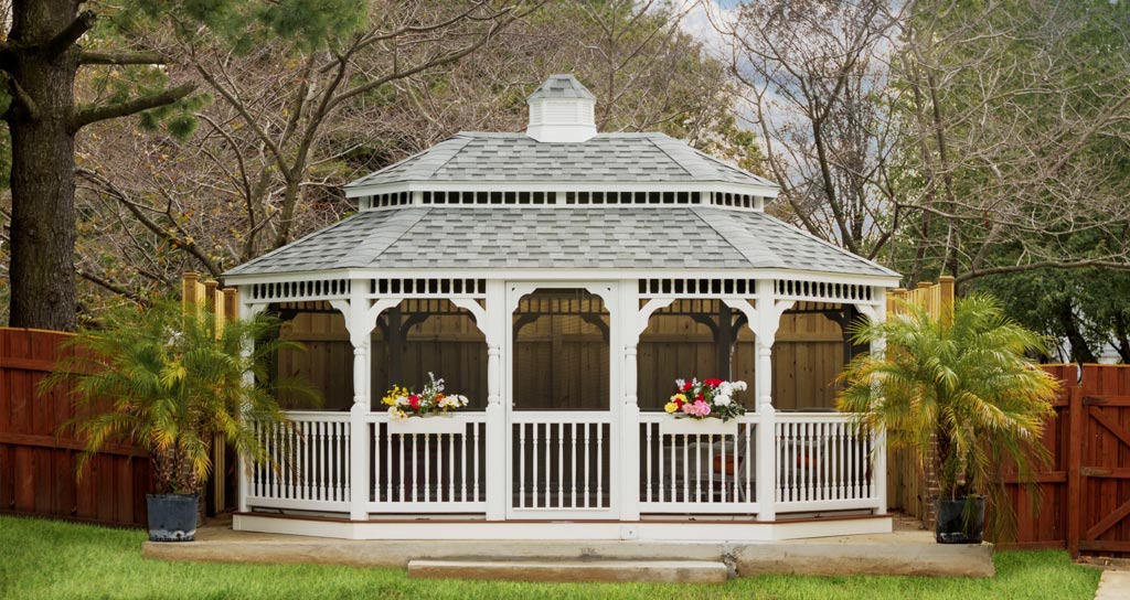 beautiful white vinyl oval gazebo in the backyard