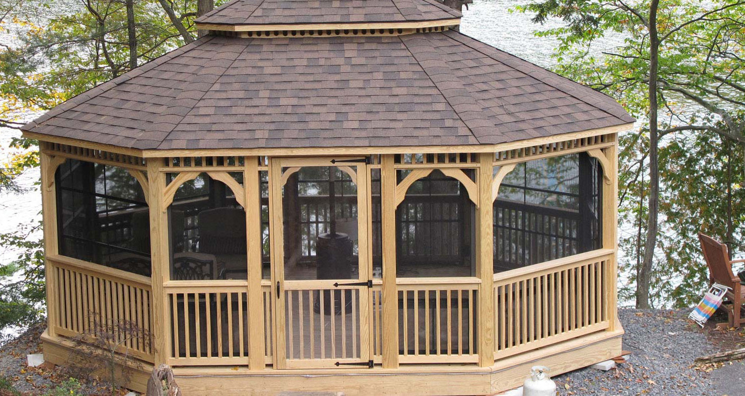 oval wooden gazebo by the lake